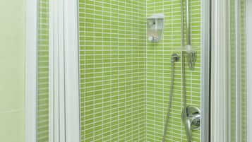Apartment, Kitchen (Casa Candida) | Bathroom | Shower, free toiletries, hair dryer, slippers