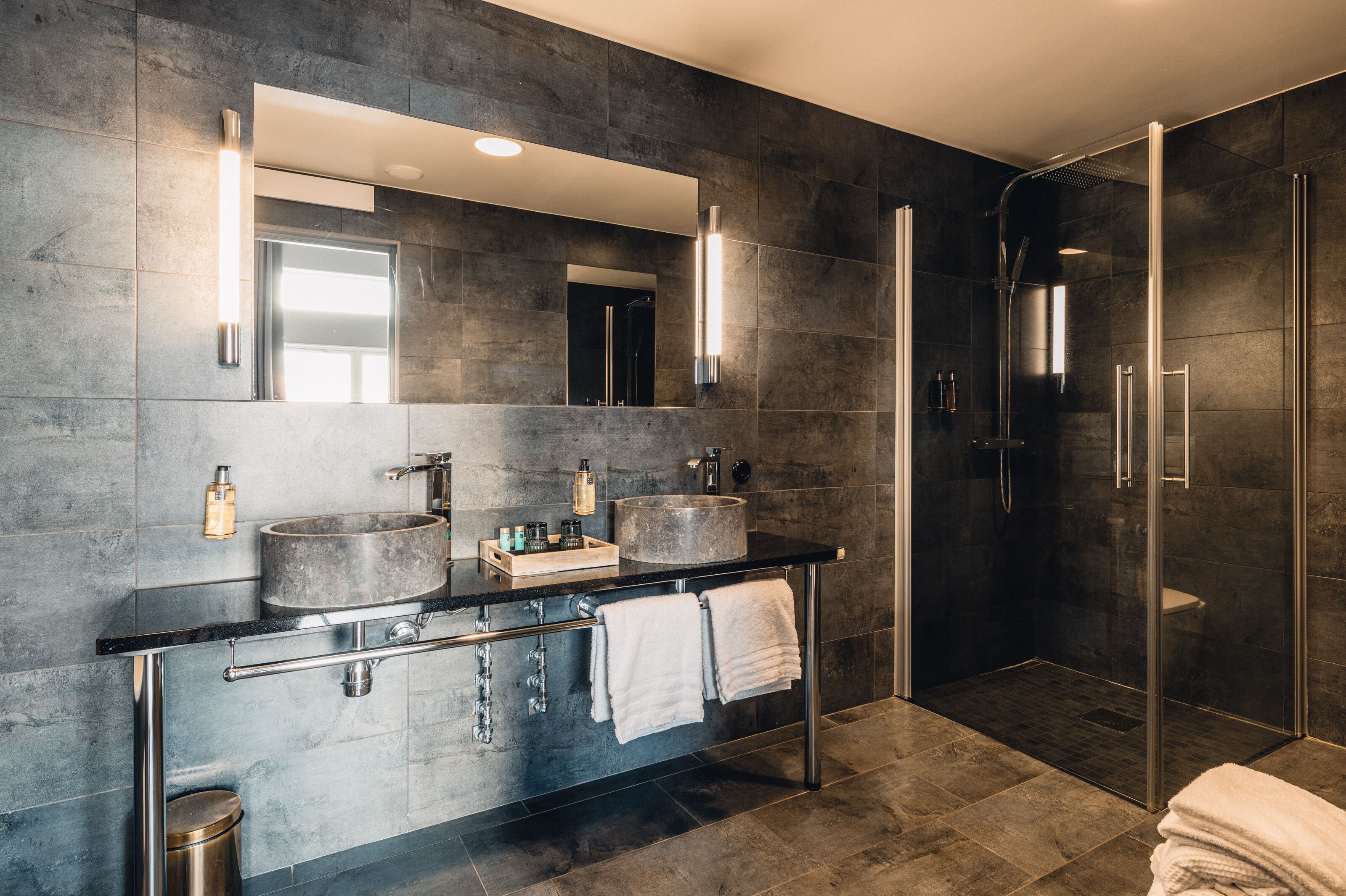 exclusive studio suite | bathroom | shower, designer toiletries, hair dryer, bathrobes