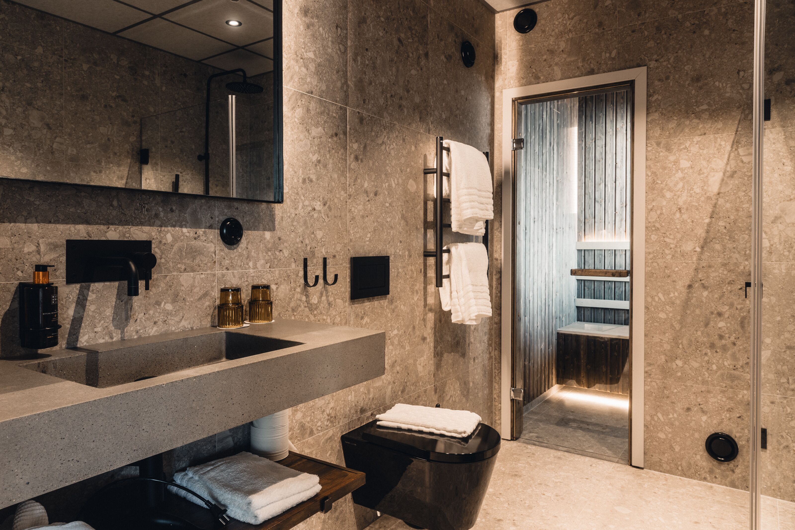 junior studio suite, sauna, ocean view | bathroom | shower, designer toiletries, hair dryer, bathrobes