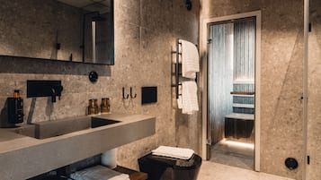 Junior Studio Suite, Sauna, Ocean View | Bathroom | Shower, designer toiletries, hair dryer, bathrobes
