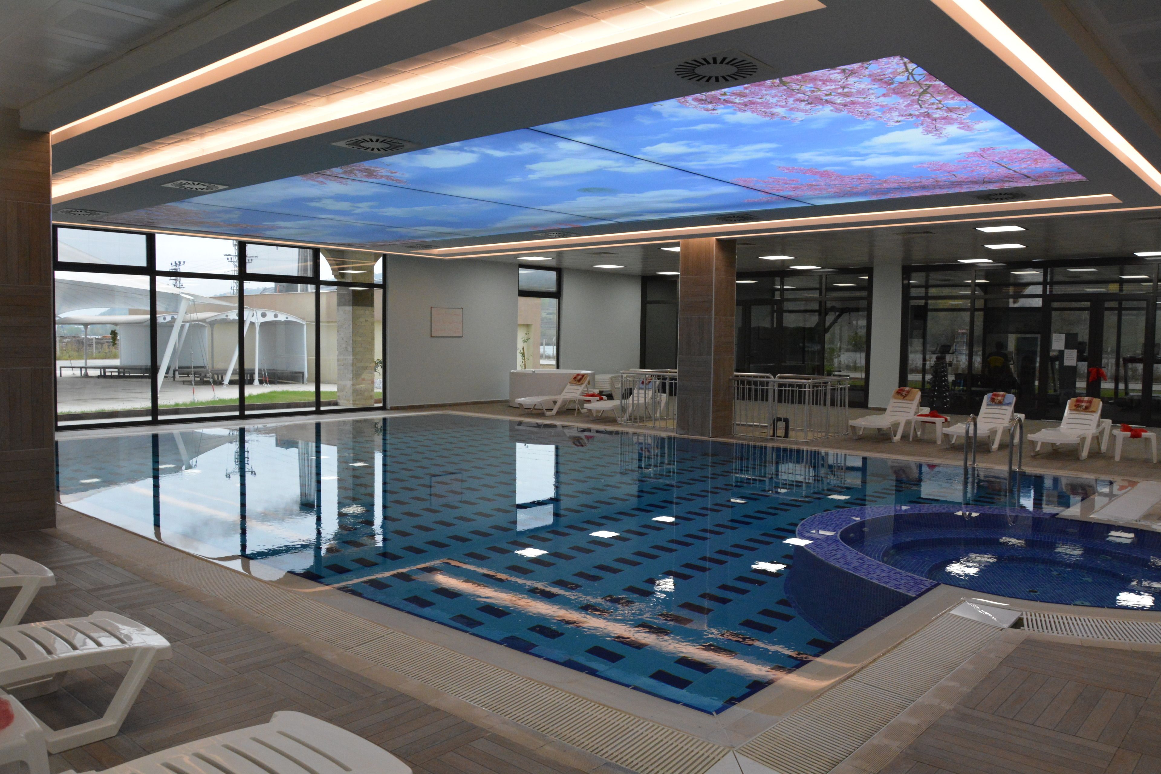 Indoor pool, seasonal outdoor pool, cabanas (surcharge), pool umbrellas