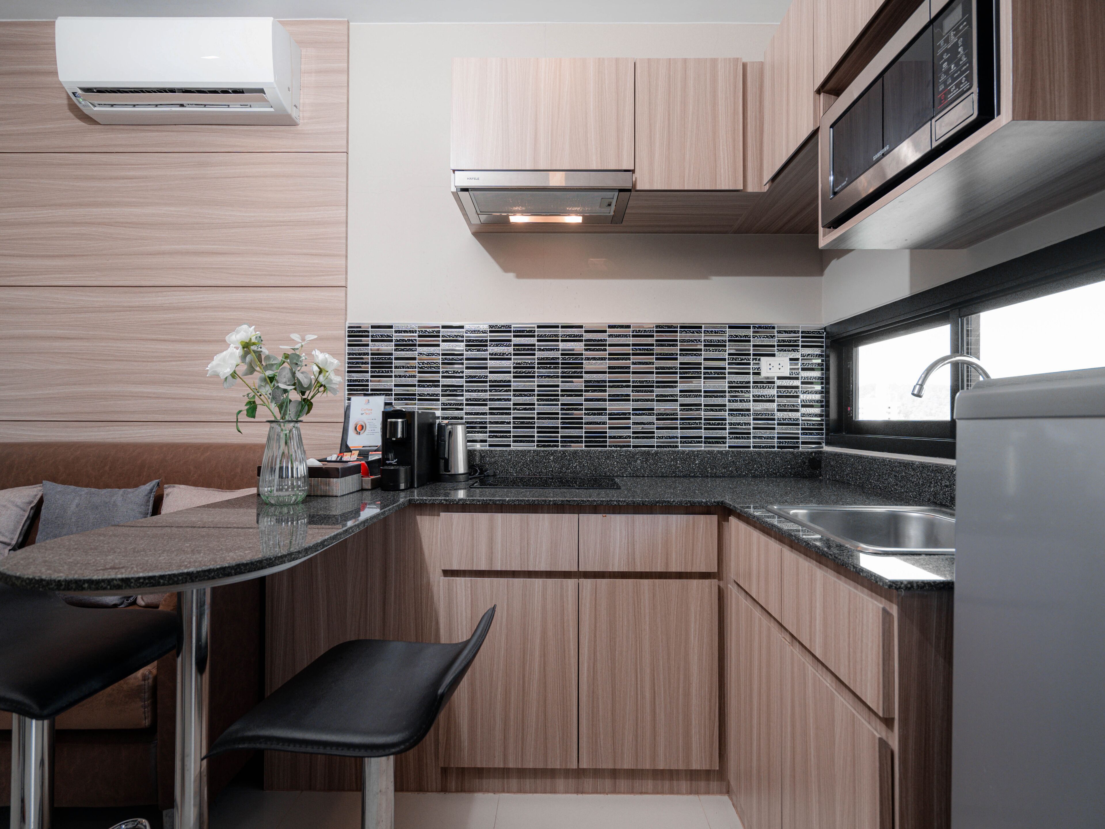 grand deluxe sunset view | private kitchen | fridge