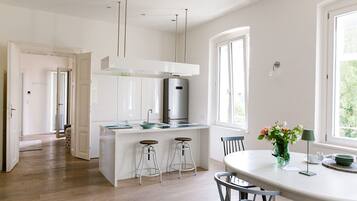 Family Apartment, 2 Bedrooms, Balcony, Lake View | Private kitchen | Full-sized fridge, oven, stovetop, dishwasher