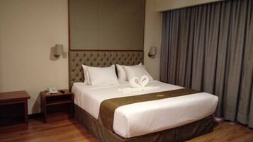 Suite | Ropa de cama hipoalergénica y minibar