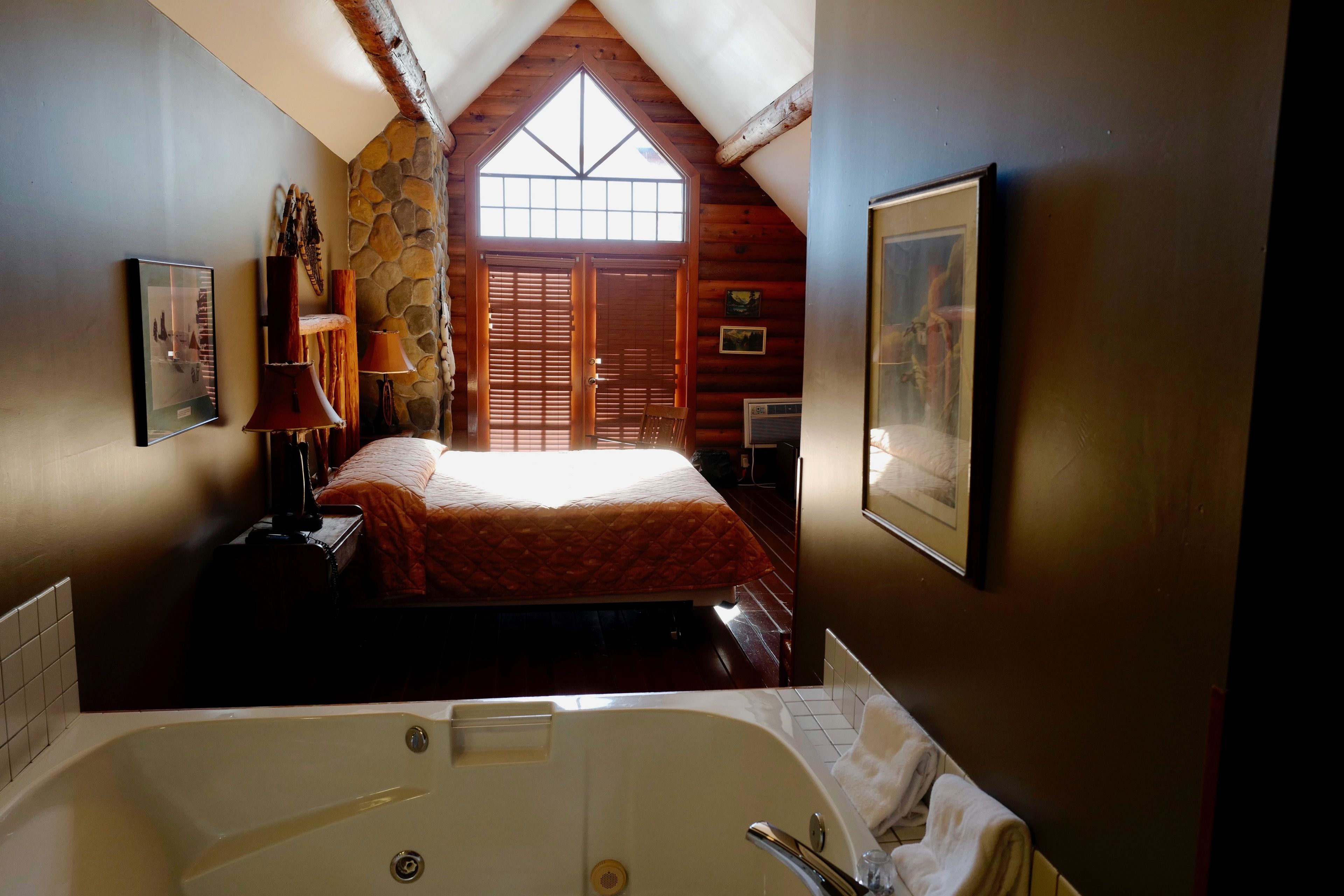 standard suite, 1 king bed, non smoking, fireplace | iron/ironing board, free rollaway beds, free wifi, bed sheets