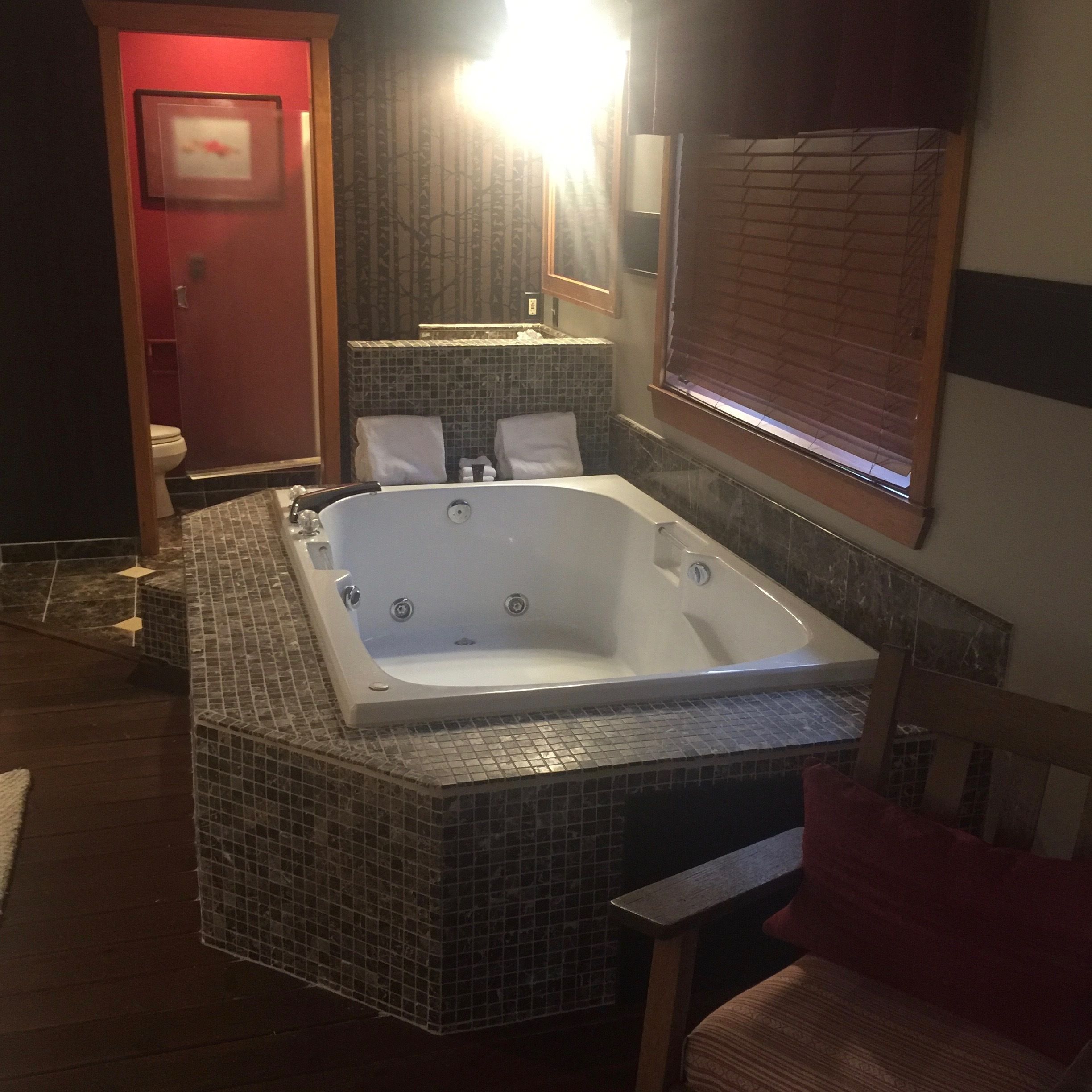 standard suite, 1 king bed, non smoking, jetted tub | iron/ironing board, free rollaway beds, free wifi, bed sheets