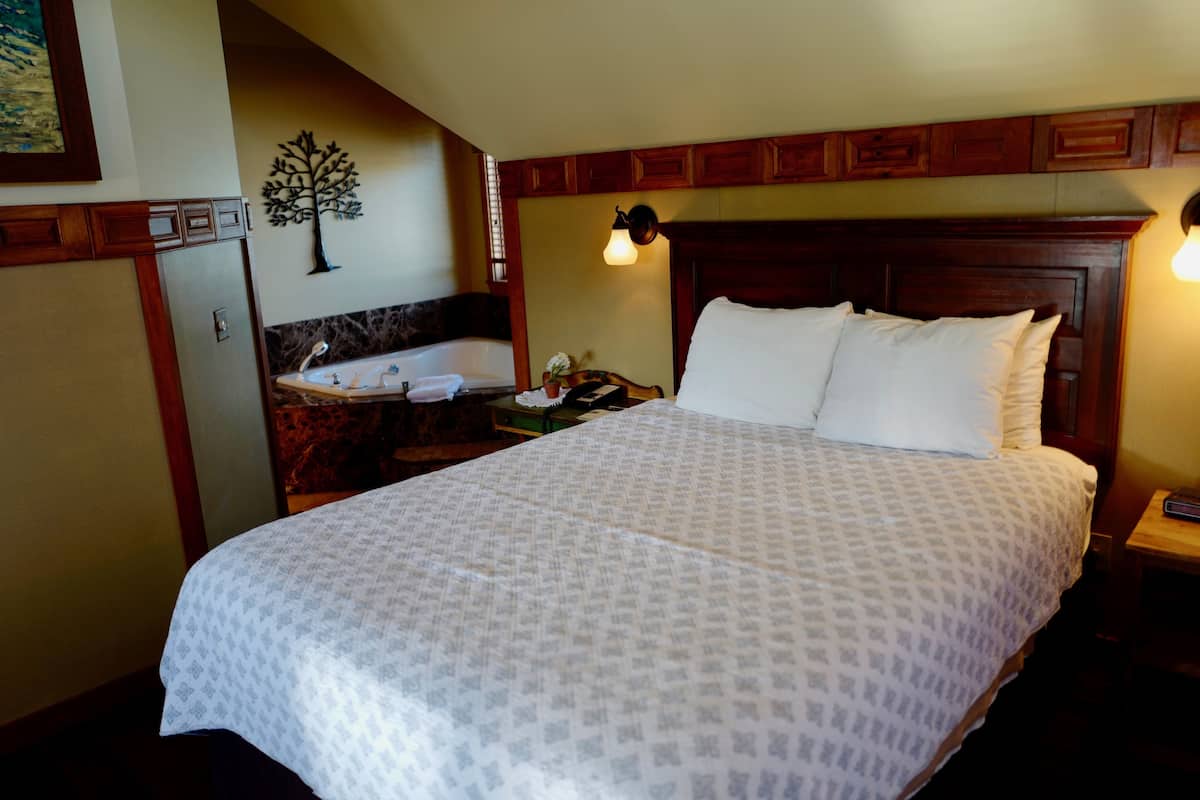 Suite, Non Smoking, Jetted Tub | Iron/ironing board, rollaway beds (free), WiFi (free), bed sheets