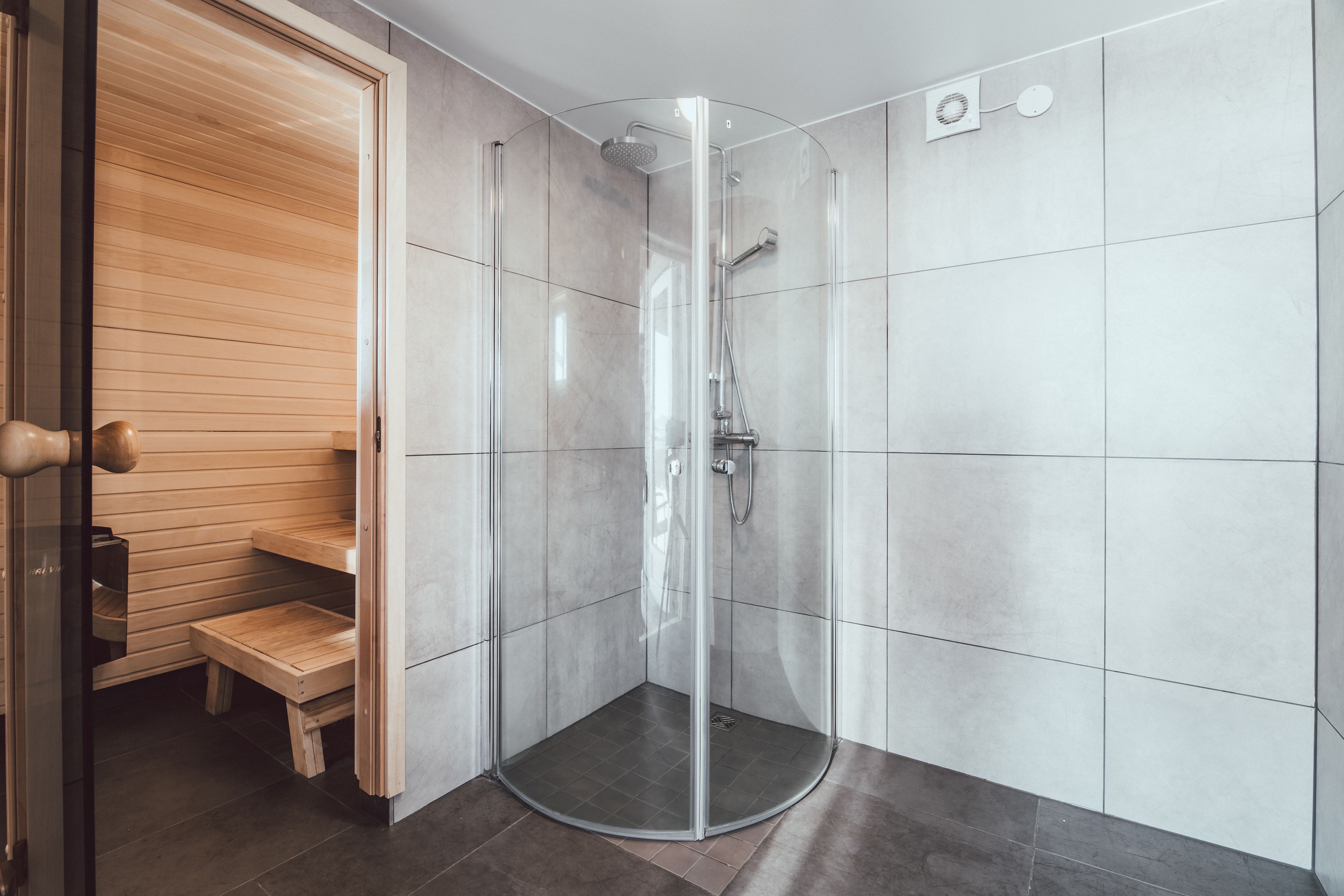 Shower, hydromassage showerhead, hair dryer, towels