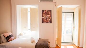 Standard Triple Room, Shared Bathroom | In-room safe, iron/ironing board, free WiFi, bed sheets