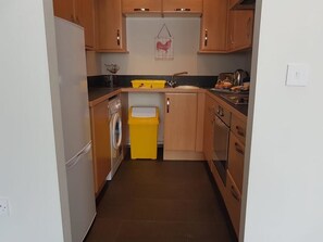 Appartement, 2 lits doubles, non-fumeur | Fer et planche à repasser, accès au Wi-Fi (inclus), literie fournie