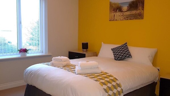 Appartement, 2 lits doubles, non-fumeur | Fer et planche à repasser, accès au Wi-Fi (inclus), literie fournie