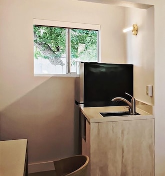 Fridge, coffee/tea maker at Sunset Inn