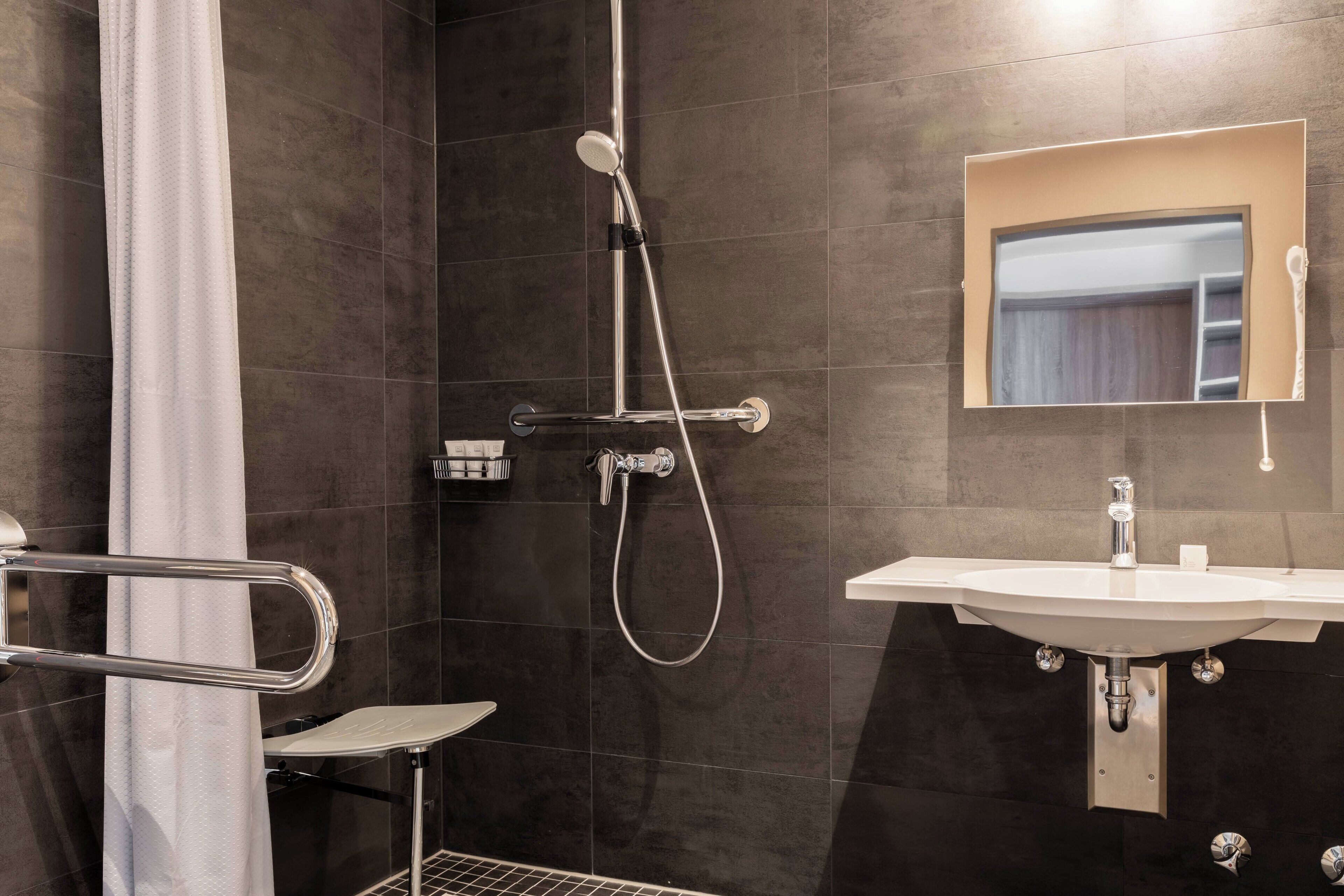 deluxe room, 1 king bed | bathroom | shower, free toiletries, hair dryer, towels