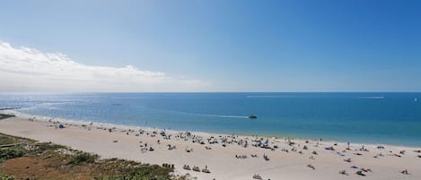 On the beach, sun-loungers, beach towels