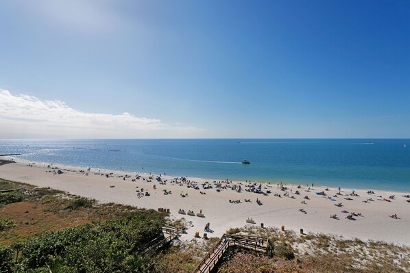 On the beach, sun loungers, beach towels