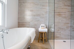 Combined shower/tub, hair dryer, towels, soap