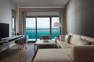 Premium Suite, Sea View | Minibar, in-room safe, desk, blackout drapes