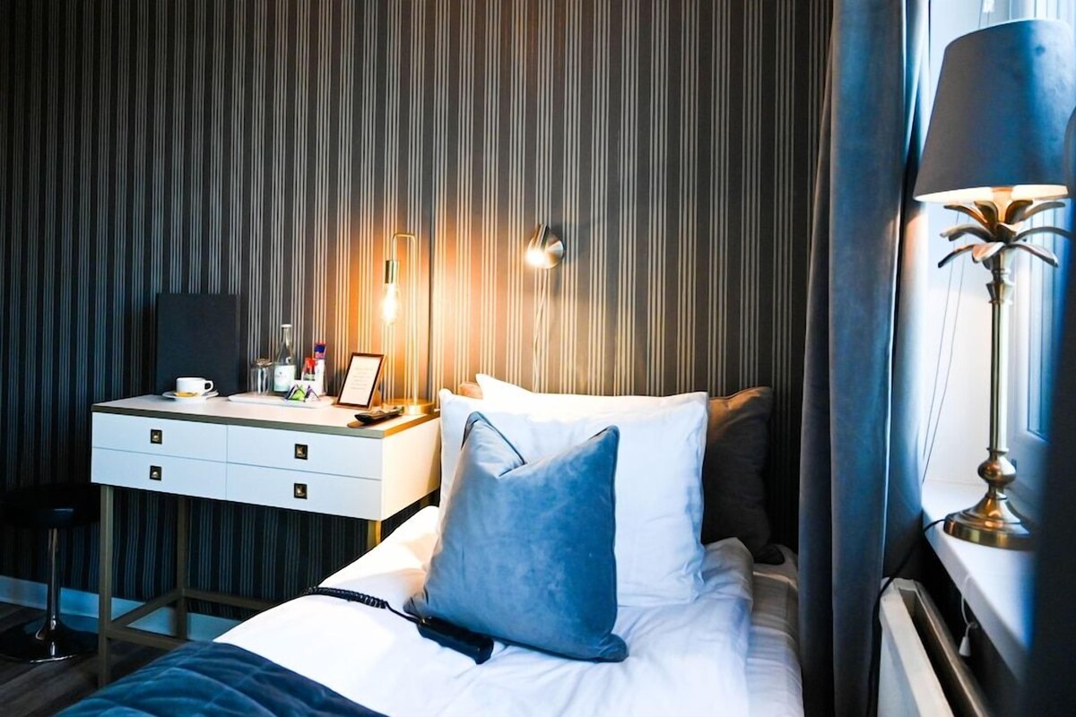 Ropa de cama de alta calidad, minibar y wifi gratis 