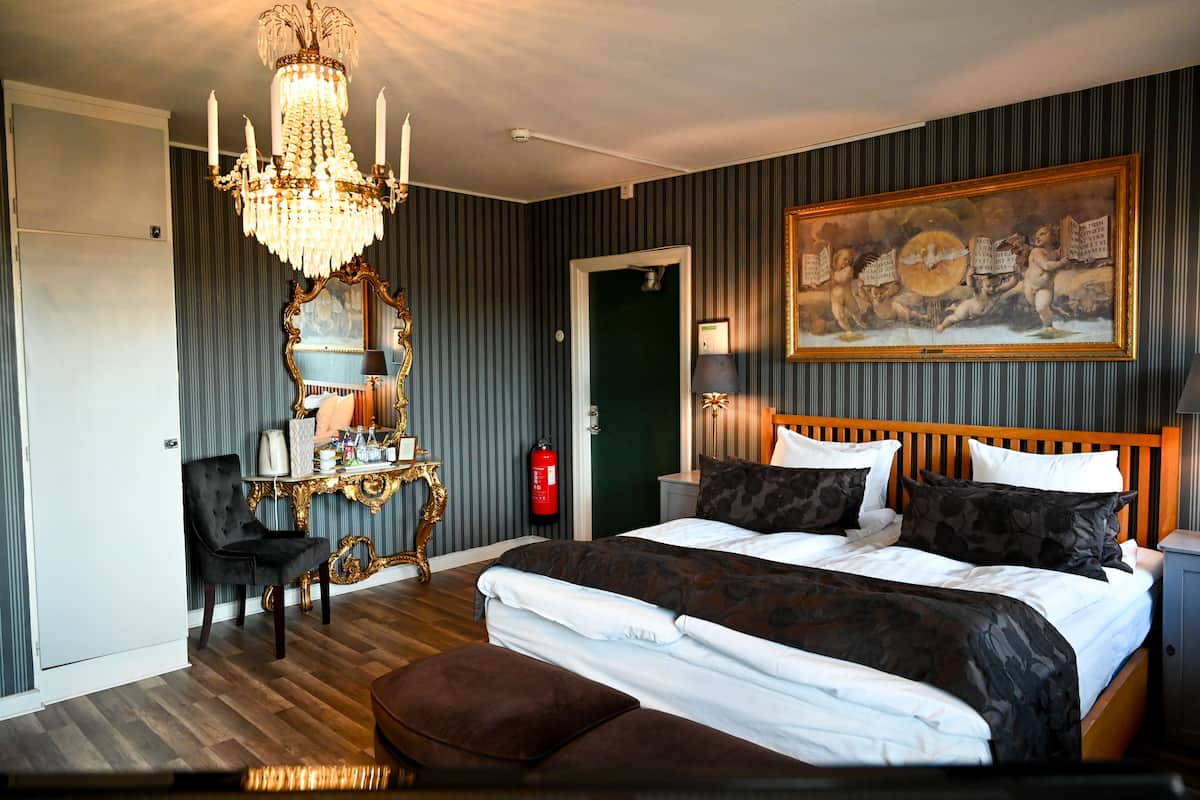 family room, multiple beds, balcony, courtyard area | premium bedding, minibar, individually decorated, individually furnished