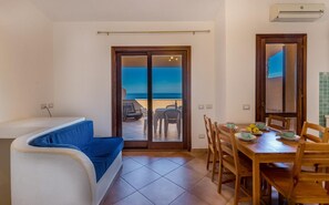 Apartment, 2 Bedrooms | Living area - Casa Rosa Cinque (Trinità d'Agultu e Vignola)