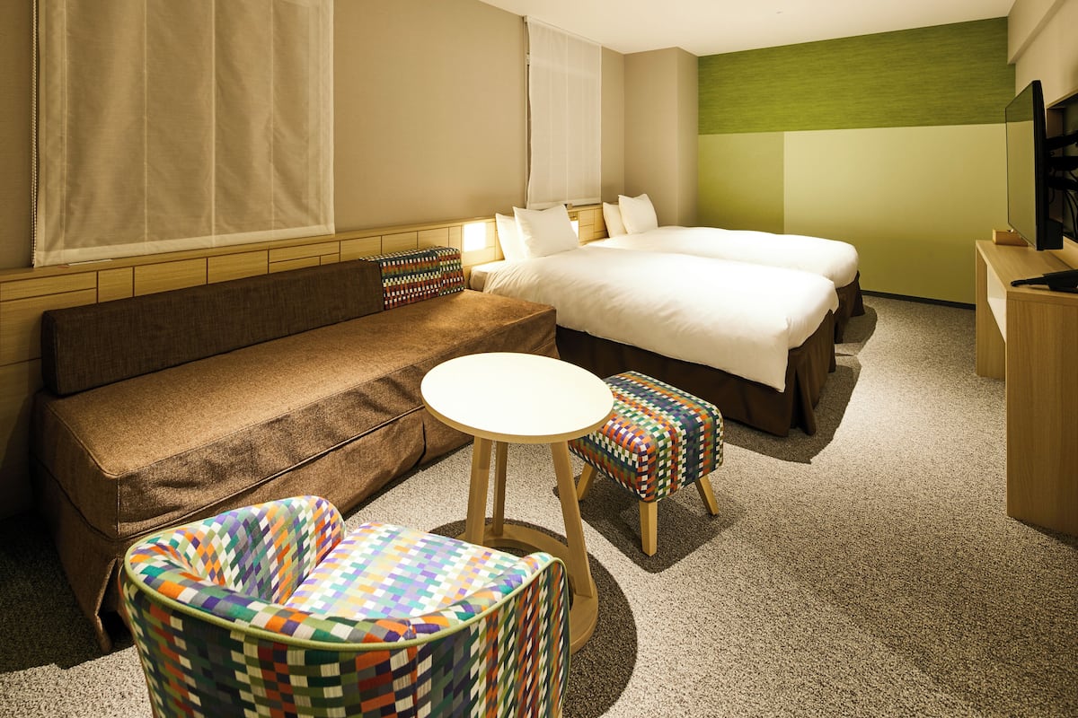 Universal Room, Non Smoking | Down comforters, in-room safe, laptop workspace, blackout drapes