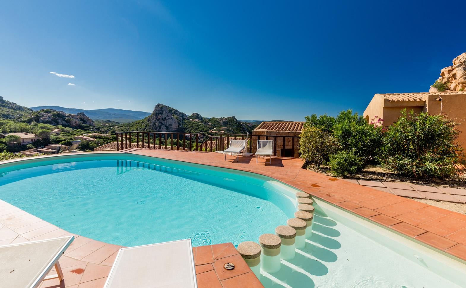 Seasonal outdoor pool, pool loungers