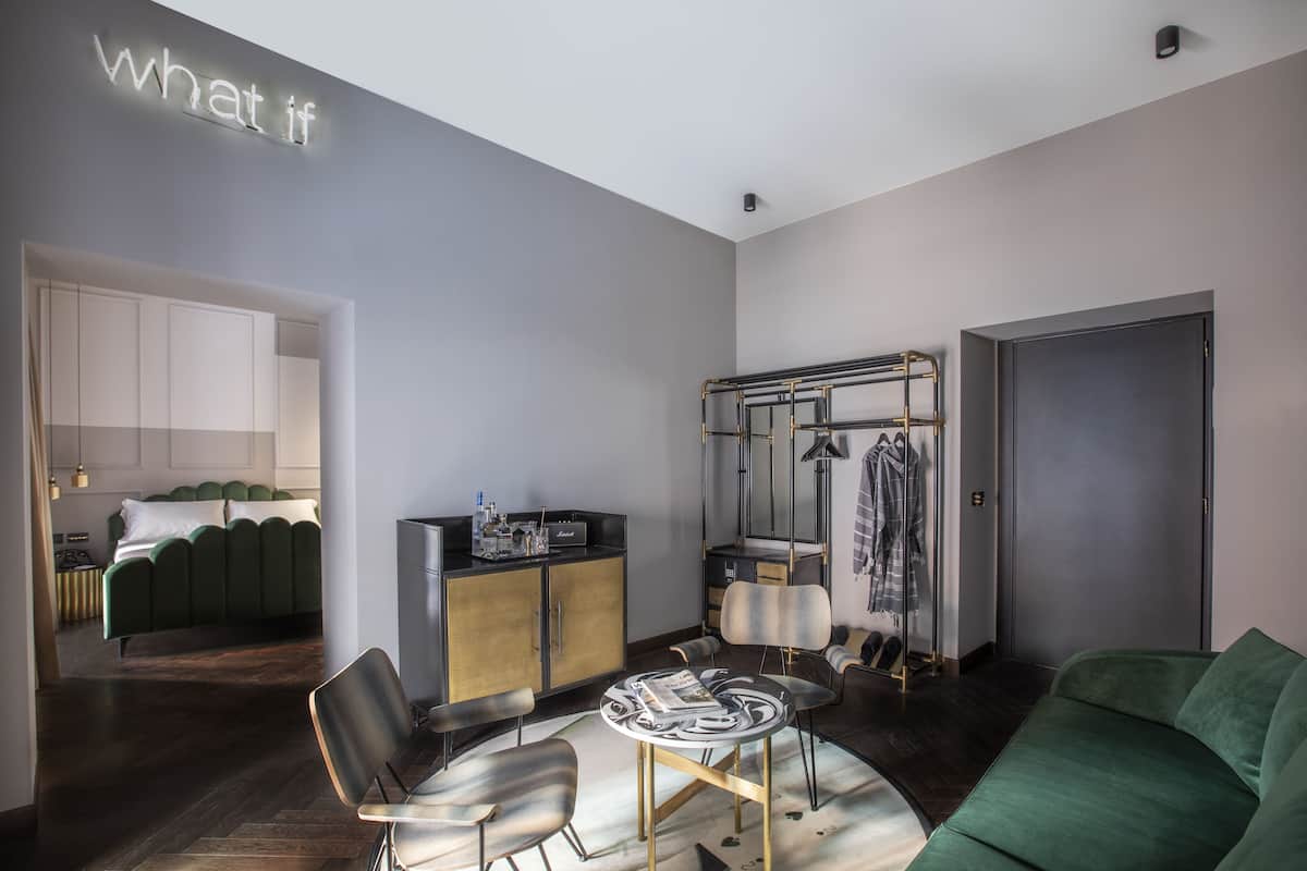 Suite | Luxe beddengoed, een minibar, een kluis op de kamer