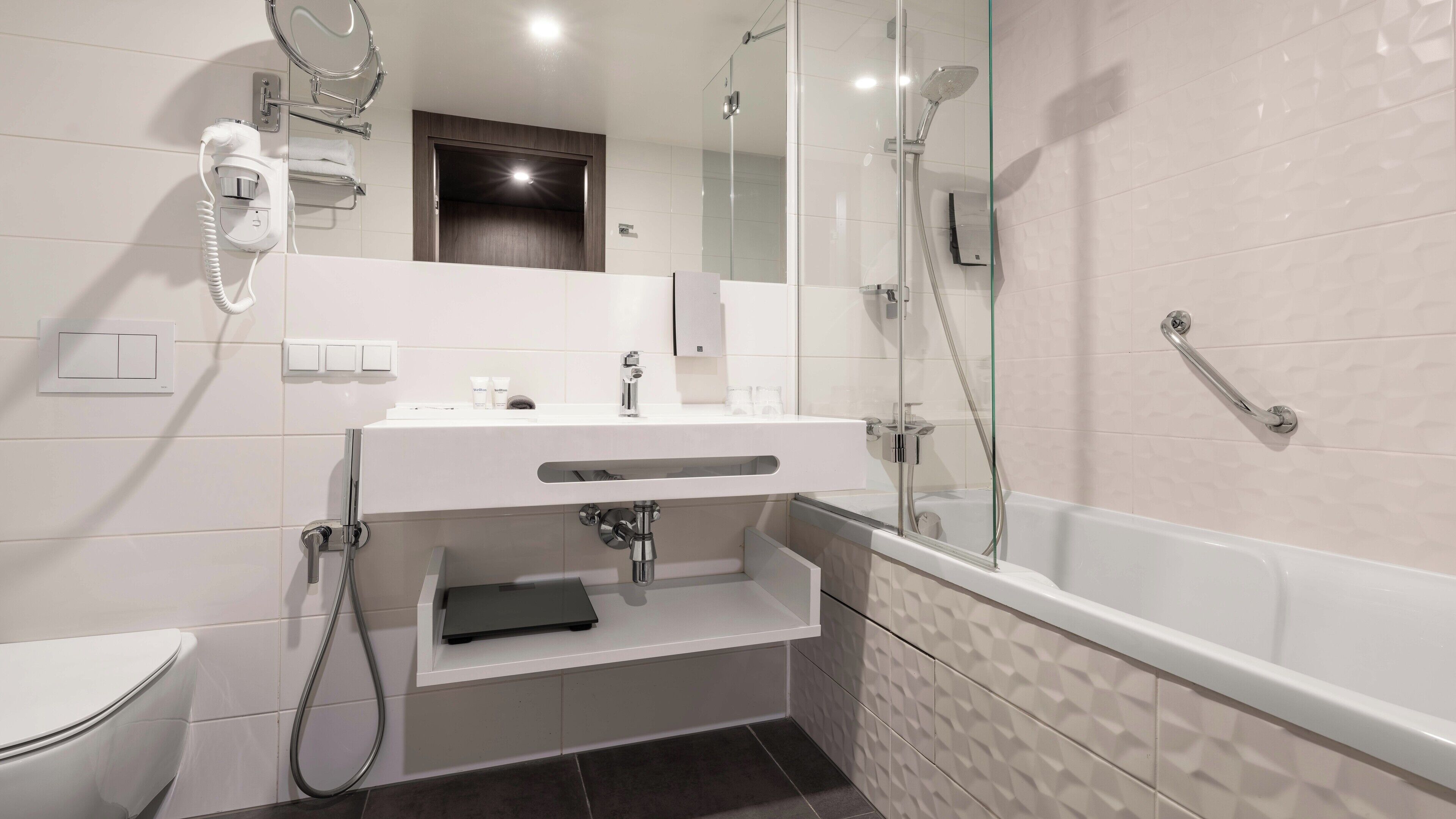 hydromassage showerhead, hair dryer, heated floors, towels