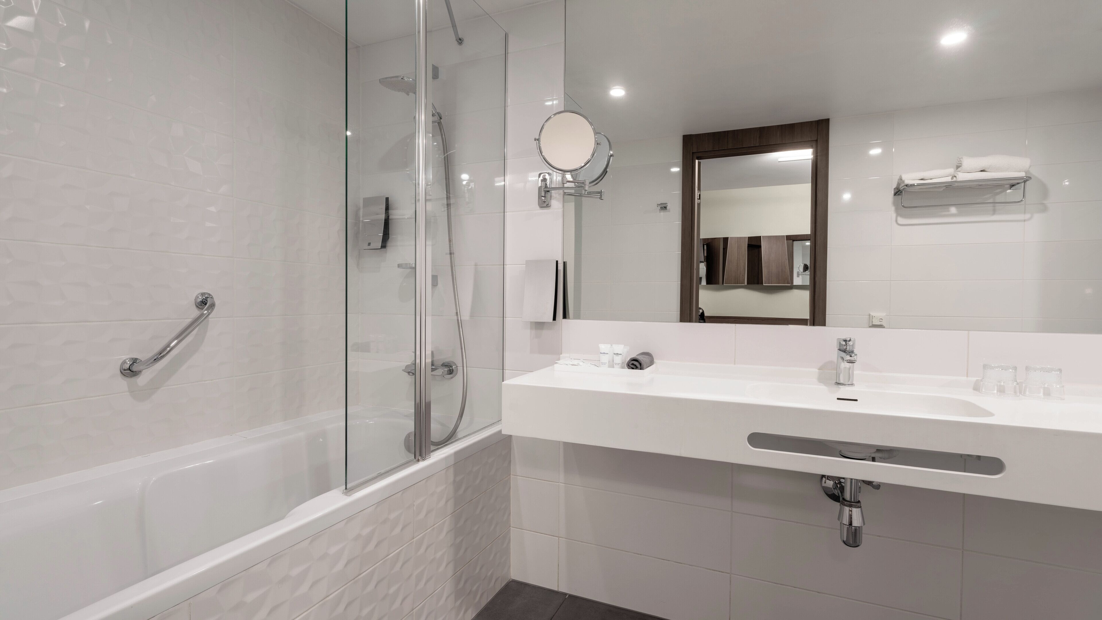 hydromassage showerhead, hair dryer, heated floors, towels