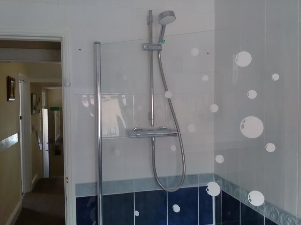 Combined shower/tub, free toiletries, hair dryer, bathrobes
