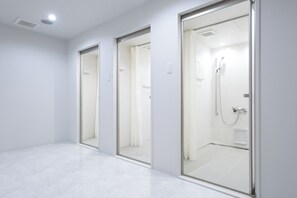 Shower, free toiletries, hair dryer, slippers