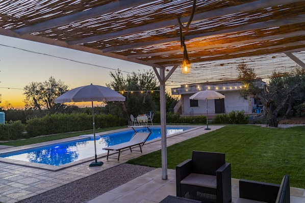 Seasonal outdoor pool, pool umbrellas, pool loungers