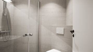 Economy Double Room, 1 Double Bed, Non Smoking | Bathroom | Shower, hair dryer, towels