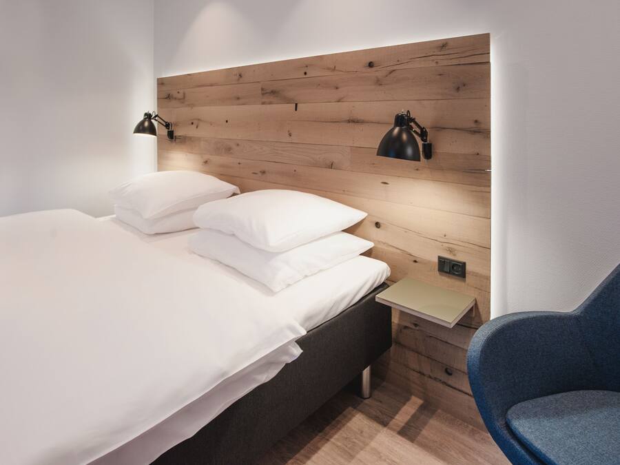 Desk, blackout curtains, free WiFi, bed sheets