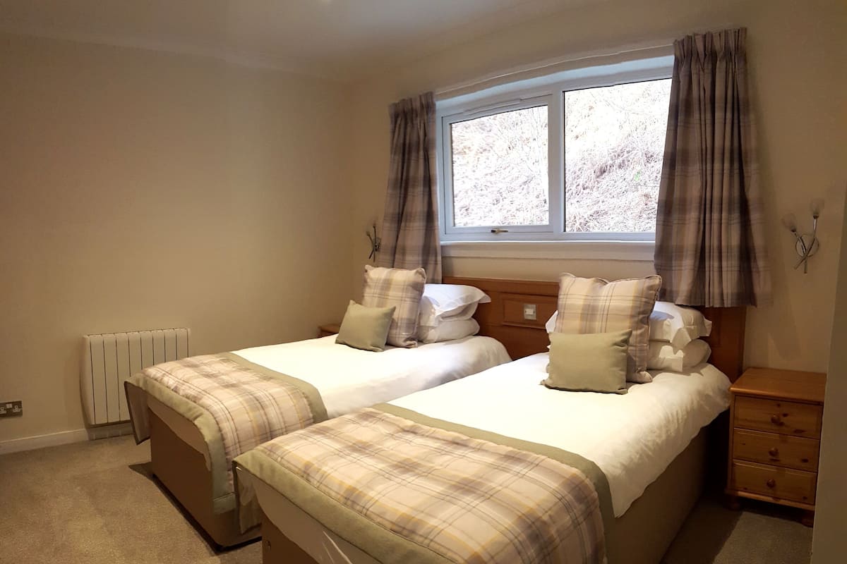 Red Deer 2 | 1 bedroom, premium bedding, blackout drapes, iron/ironing board