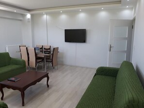 35-inch flat-screen TV with satellite channels, LCD TV