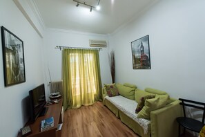 Apartment, 1 Bedroom | Living area | LCD TV, DVD player - Athinian apartment veikou (Athens)