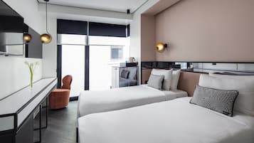 Habitación estándar con 2 camas individuales | Minibar, caja fuerte, cortinas opacas y sistema de insonorización