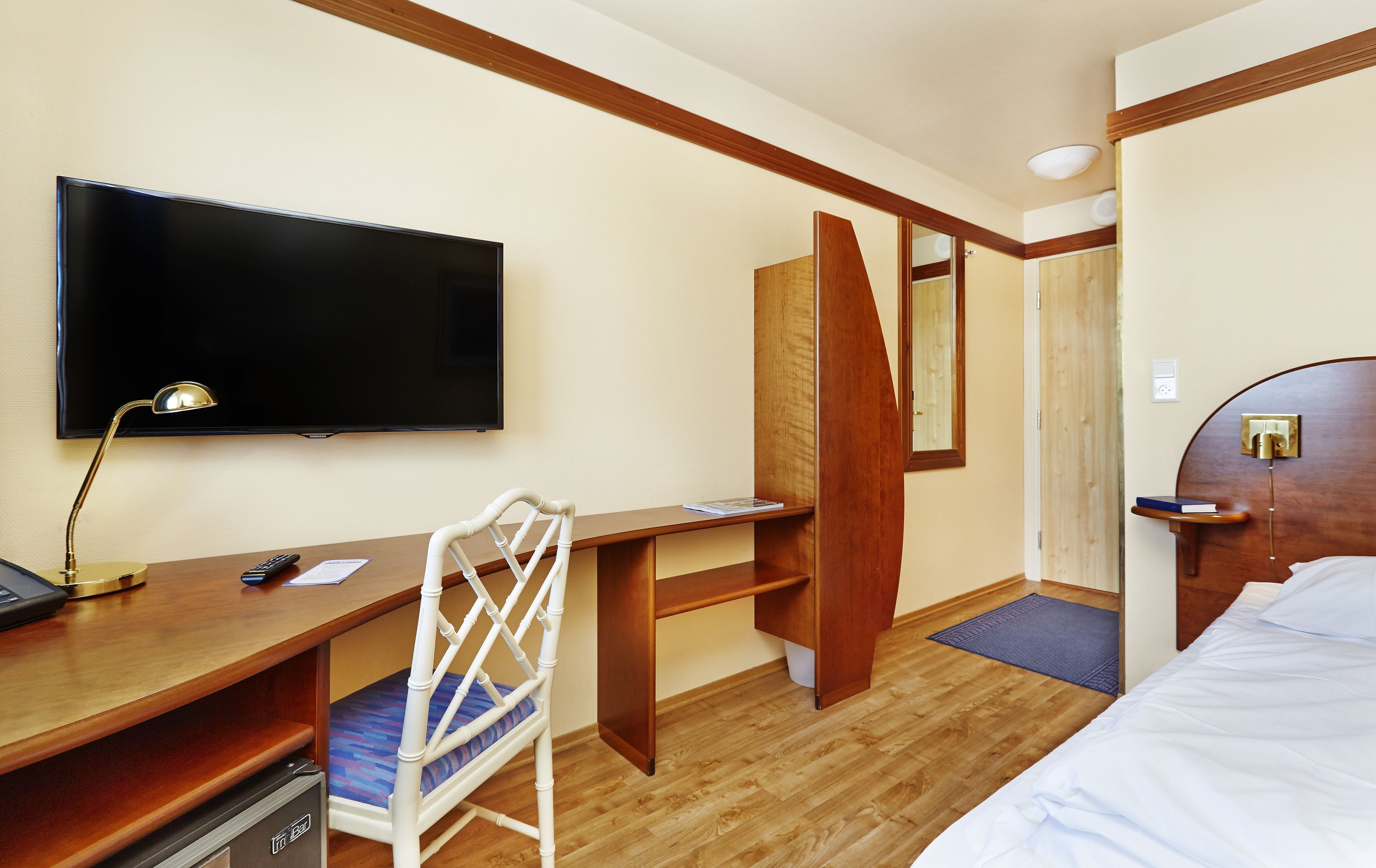 Camas con pillow-top, minibar y escritorio 