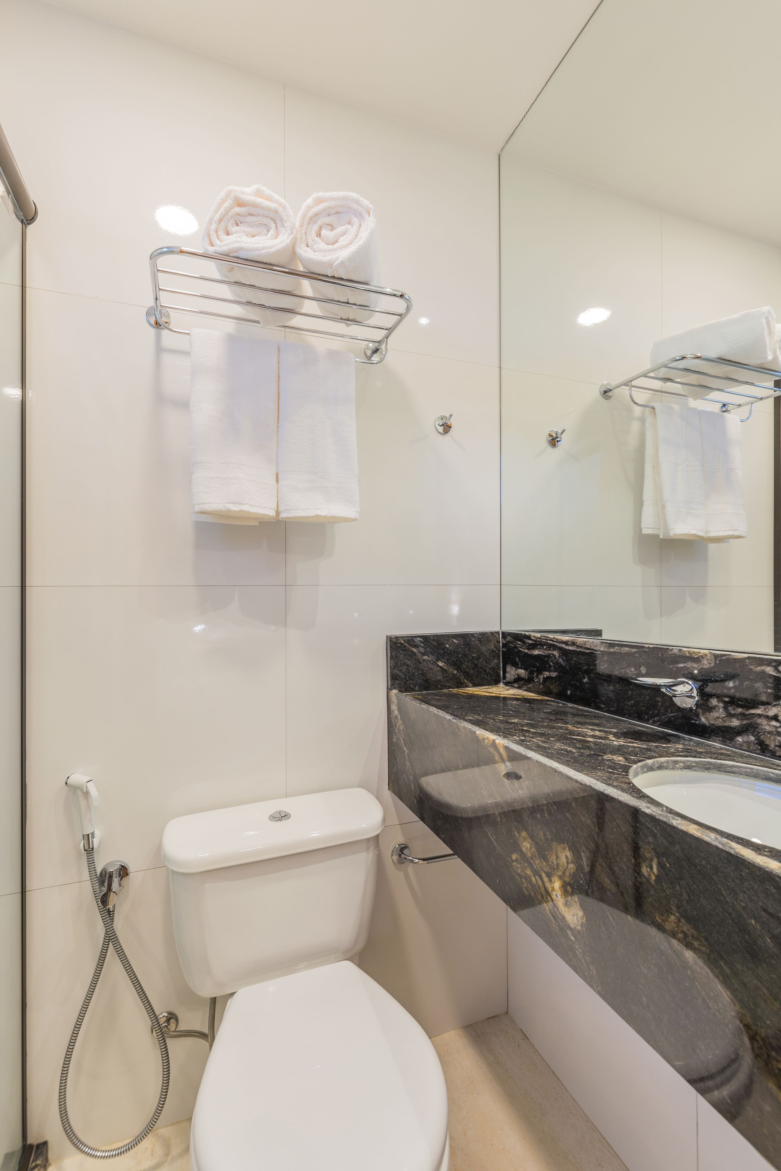 deluxe twin room | bathroom | shower, hair dryer, towels