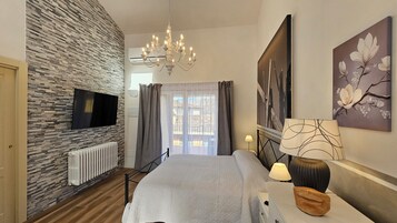 Family Room, 1 Bedroom, Non Smoking, Hill View | Down comforters, desk, blackout drapes, iron/ironing board