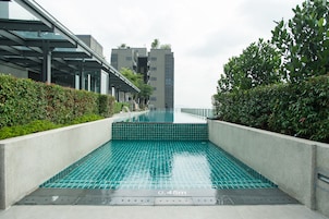 Outdoor pool, a rooftop pool, sun loungers