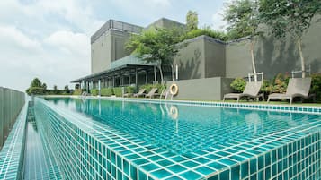 Outdoor pool, a rooftop pool, sun loungers