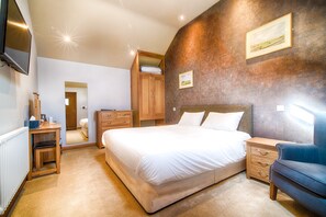 Habitación Deluxe con 1 cama matrimonial o 2 individuales | Escritorio, wifi gratis y ropa de cama 