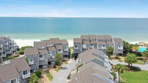 A beachfront residential area with multi-story buildings, a clear view of the ocean, and a swimming pool. - Barrier Dunes, Close to Beach (Cape San Blas)
