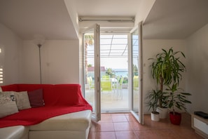Apartment, Sea View | Living area | Flat-screen TV, fireplace - Villa Juradin (Podstrana)