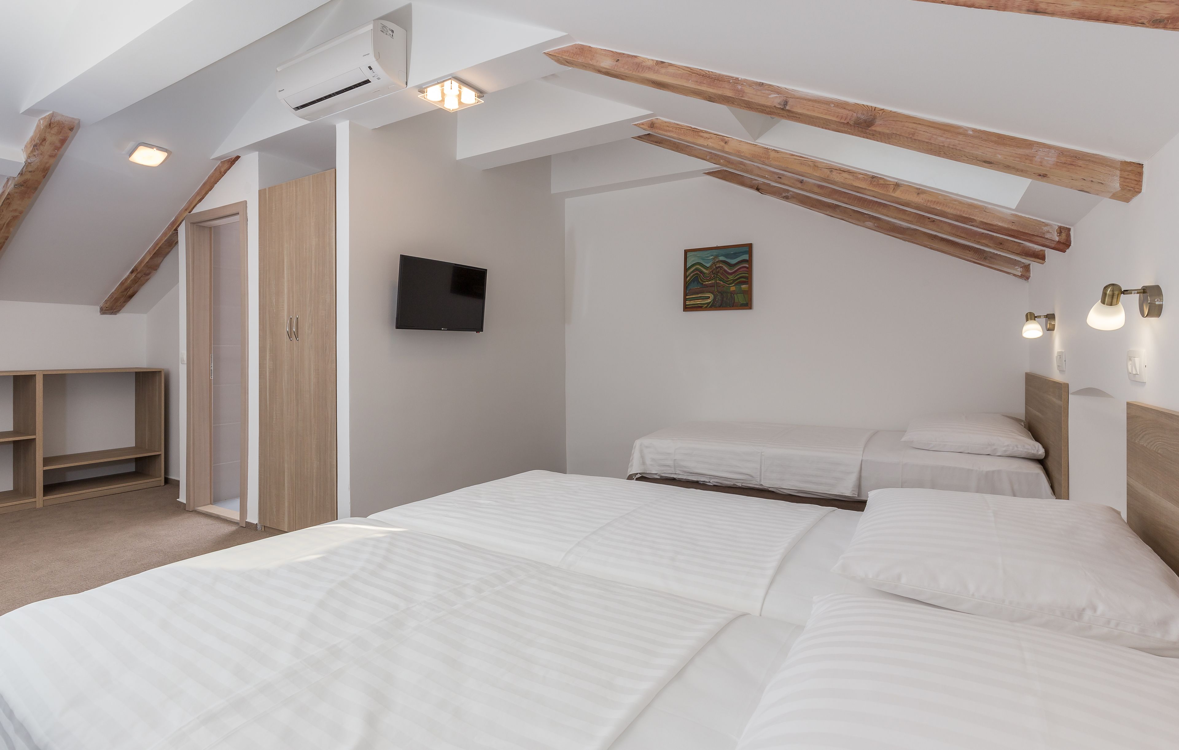 triple room, sea view | minibar, in-room safe, desk, free cots/infant beds