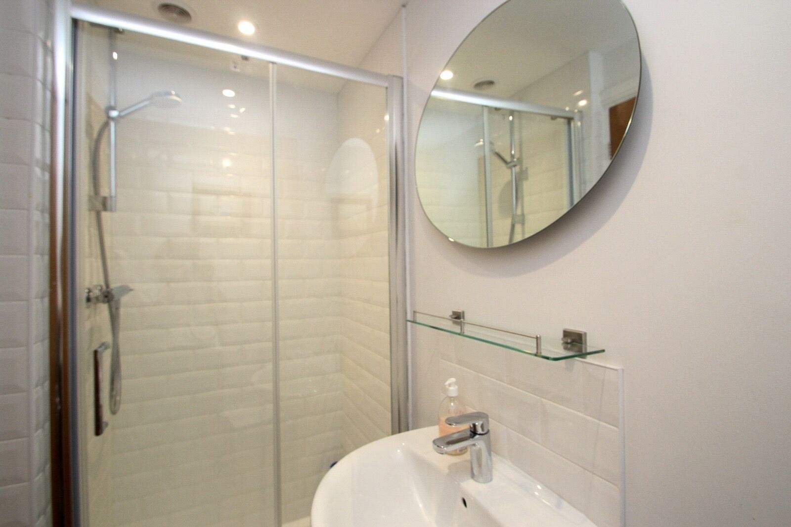Combined shower/tub, hair dryer, towels, soap