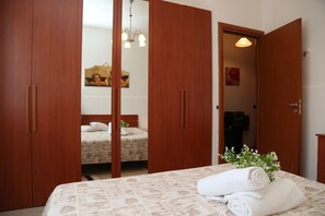 2 dormitorios, tabla de planchar con plancha, wifi gratis y ropa de cama