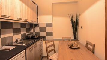 Apartment, Ground Floor | Private kitchen | Fridge, stovetop, cookware/dishes/utensils
